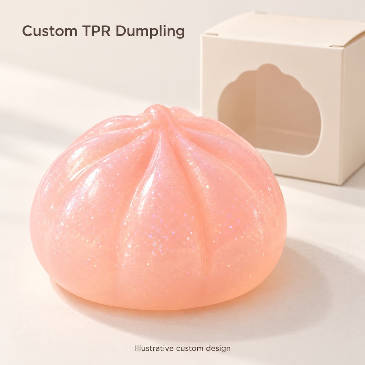 Peach-pink dumpling squishy concept with rounded pleats and a cream packaging mockup